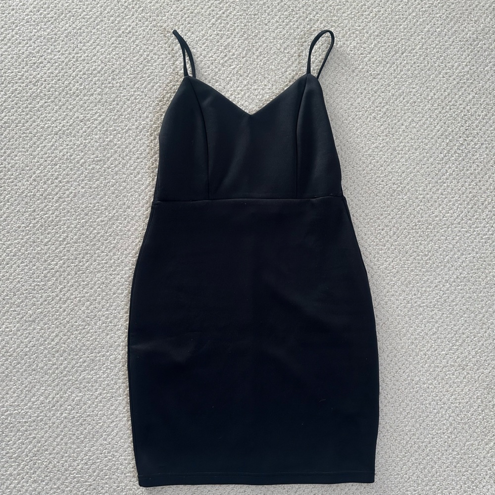 Black mini dress with mesh detailing on back